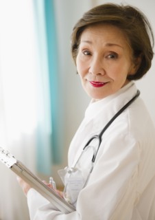 Japanese doctor holding medical chart
