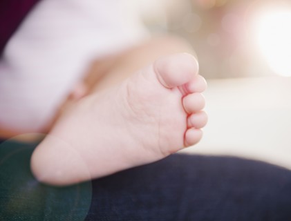 Close up of mixed race baby's foot