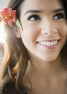 Hispanic woman with flower in her hair