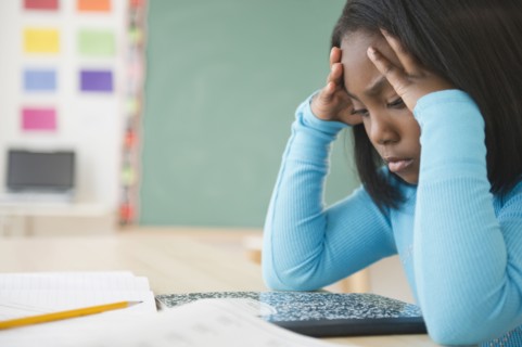Black student studying in classroom