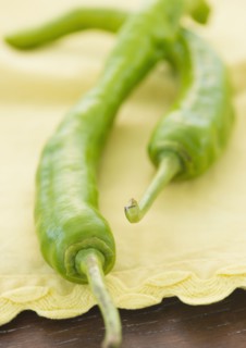 Close up of green chili peppers