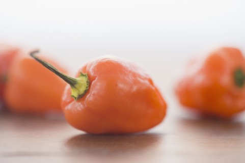 Close up of orange chili peppers