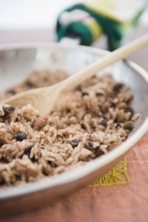 Rice and beans cooking in skillet