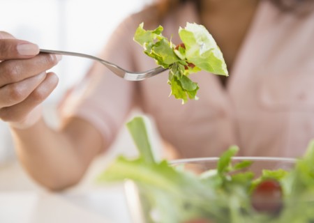Cape Verdean woman eating salad