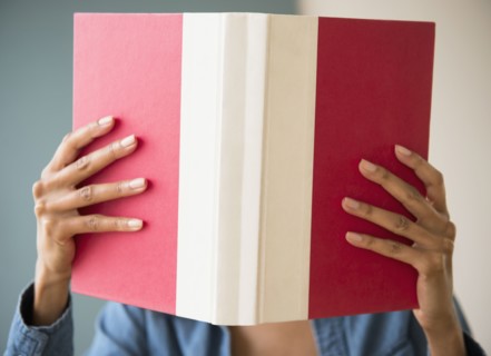 Cape Verdean woman reading a book