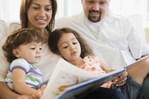Family reading book together
