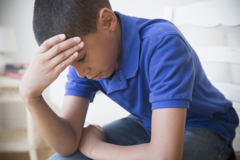 Unhappy Hispanic boy