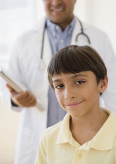Hispanic boy in doctor's office