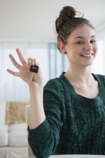 Hispanic girl holding car keys
