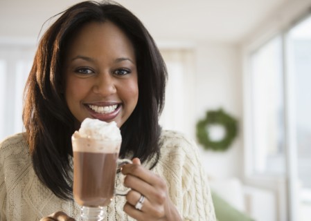 African American woman drinking hot chocolate