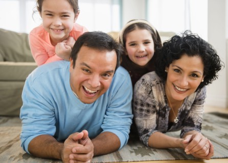 Family relaxing together in living room