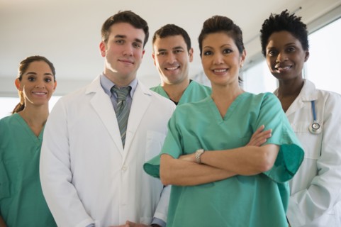 Nurses and doctors smiling in hospital