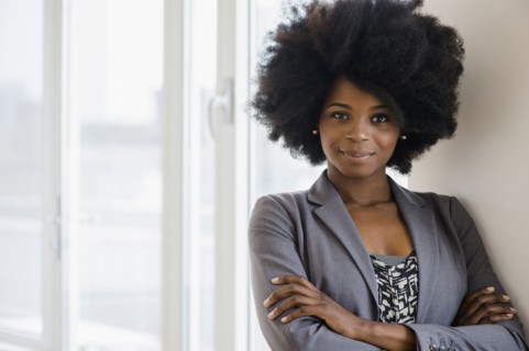 Mixed race businesswoman smiling