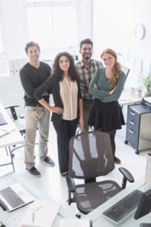Business people smiling together in office