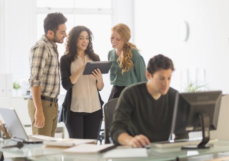 Business people using digital tablet in office