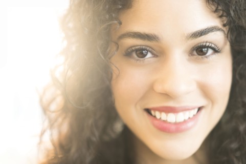Mixed race woman smiling