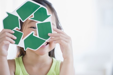 Korean girl holding recycle symbol