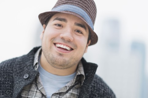 Mixed race man smiling