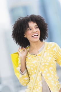 African American woman with shopping bag