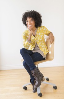 African American woman sitting in office chair