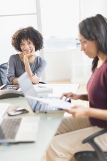 African American businesswomen working in office