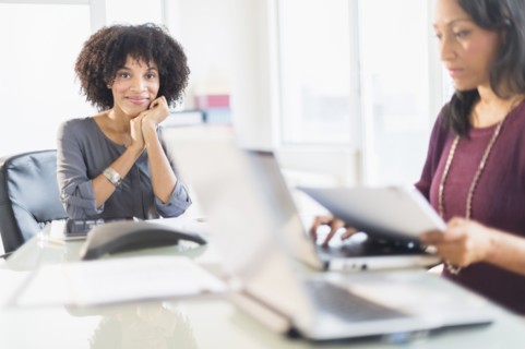 African American businesswomen working in office