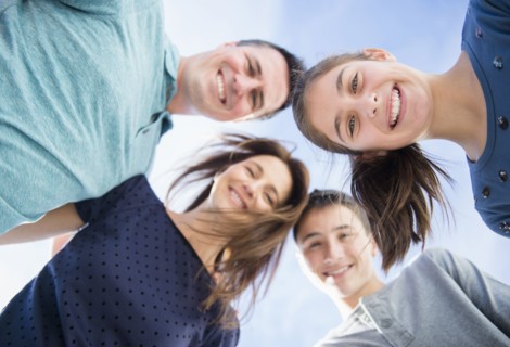 Portrait of smiling Caucasian family in huddle