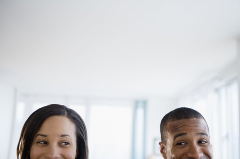 Couple engaged in sideways glance