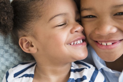 Black children smiling together