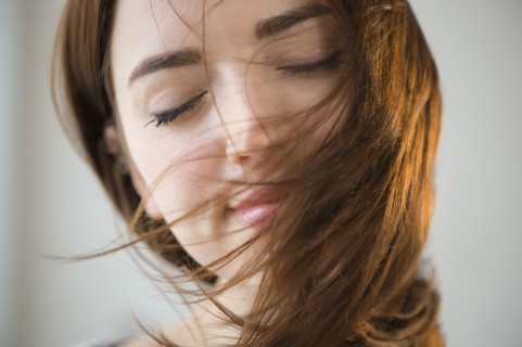 Woman's hair blowing in wind