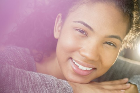 Mixed race woman smiling