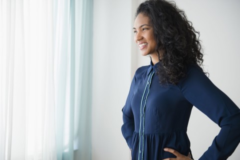 Mixed race woman smiling