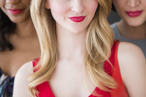 Women wearing lipstick together