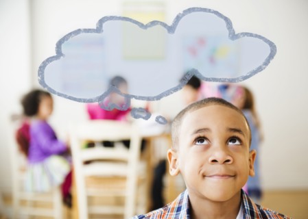 Boy with thought bubble over his head