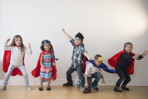 Children playing in capes