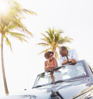 Couple relaxing together in car