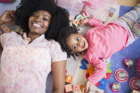 Mother and daughter playing together
