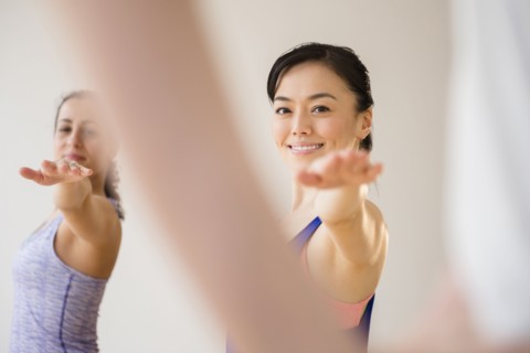 Women practicing yoga