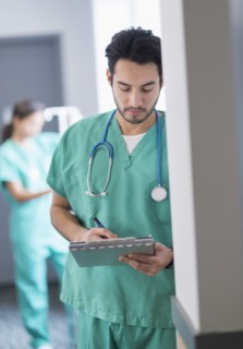Mixed race nurse working in hospital