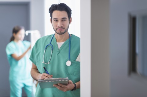Mixed race nurse working in hospital