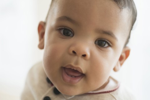 Close up of mixed race baby's face