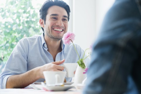 Couple eating breakfast together