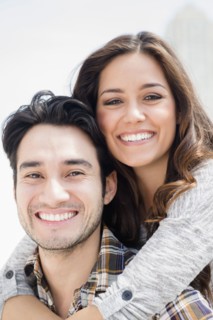 Smiling couple hugging