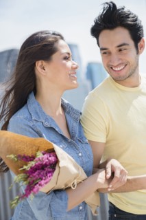 Couple walking together on city street