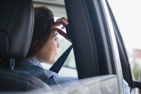 Woman smiling in car