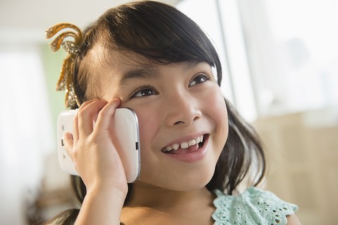 Filipino girl talking on cell phone