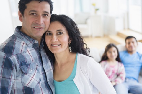 Hispanic family smiling together