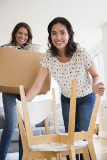 Hispanic women moving house
