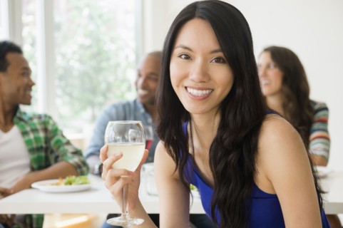 Woman smiling at restaurant