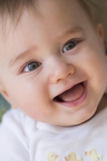 Close up of smiling mixed race baby